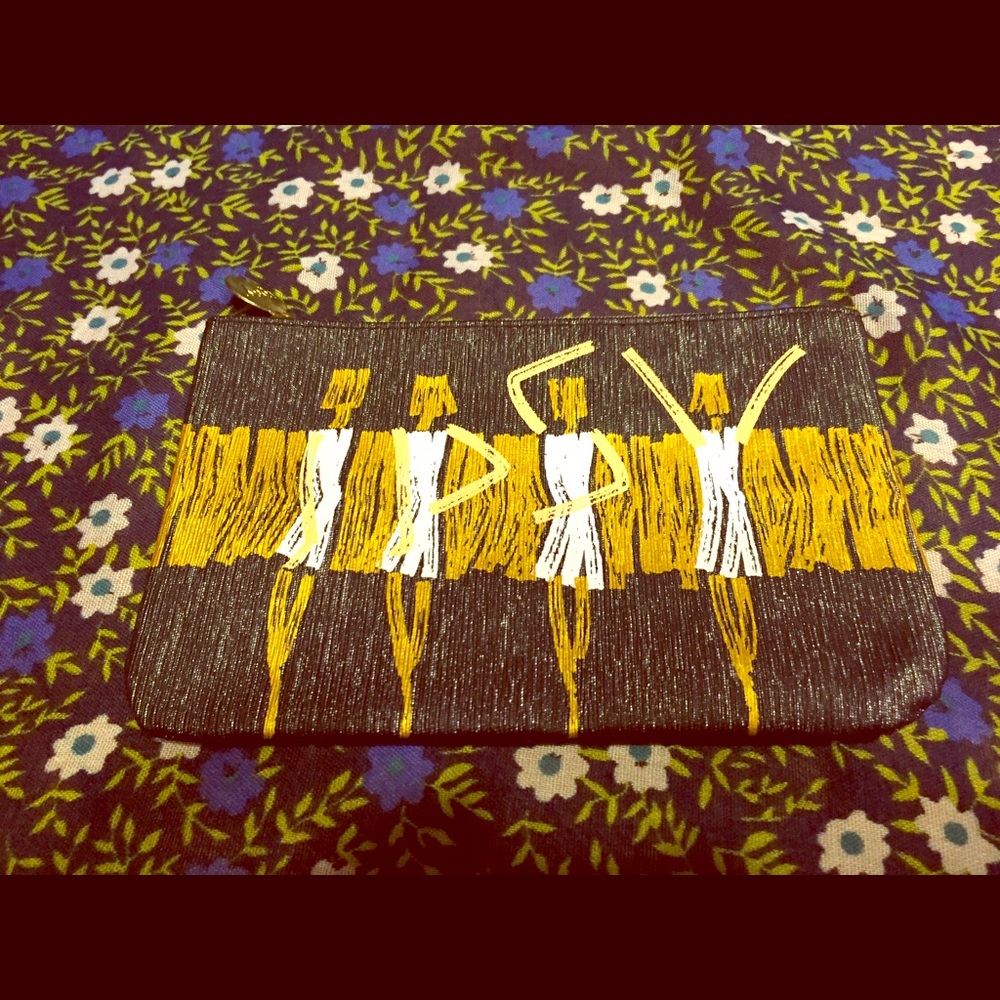 Black Ipsy makeup bag w a dancing stick ladies.